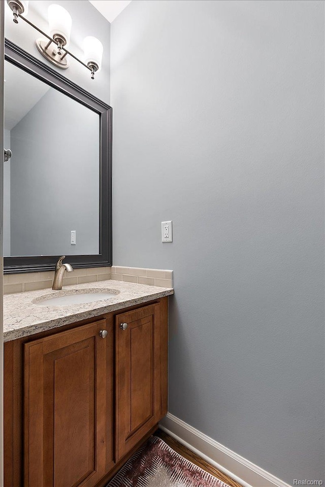 8507 Newbury Ct N, Canton, MI 48187 - bathroom featuring vanity and baseboards