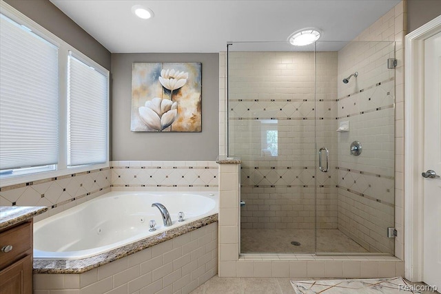 8507 Newbury Ct N, Canton, MI 48187 - bathroom with a jetted tub, a shower stall, plenty of natural light, tile patterned flooring, and recessed lighting