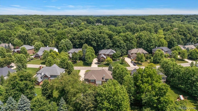 8507 Newbury Ct N, Canton, MI 48187 - aerial perspective of suburban area featuring a forest