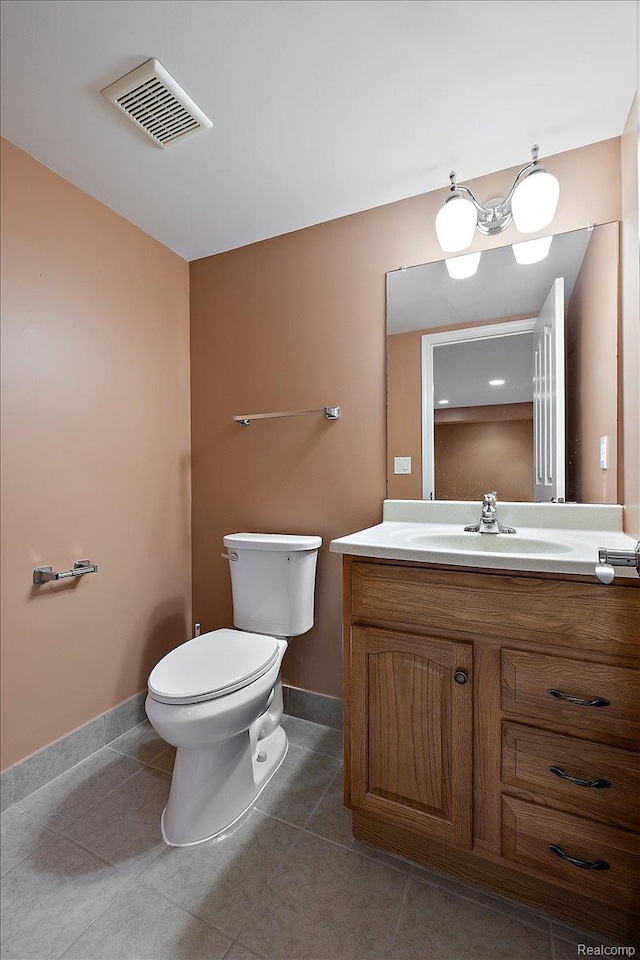 8507 Newbury Ct N, Canton, MI 48187 - half bathroom featuring vanity and tile patterned flooring