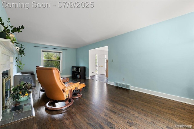 32010 Inglewood St, Franklin, MI 48025 - living area with wood finished floors and a glass covered fireplace