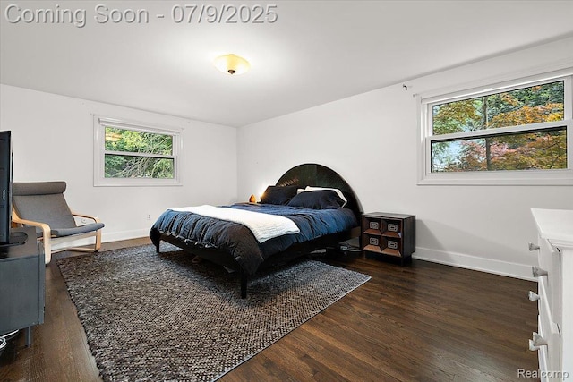 32010 Inglewood St, Franklin, MI 48025 - bedroom with multiple windows and wood finished floors