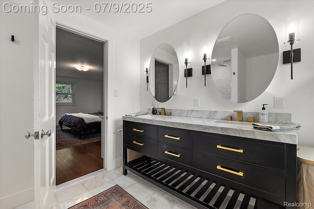 32010 Inglewood St, Franklin, MI 48025 - ensuite bathroom with double vanity and marble look tile flooring