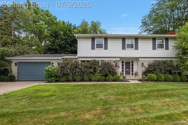32010 Inglewood St, Franklin, MI 48025 - view of front of property featuring a front lawn, an attached garage, concrete driveway, and brick siding