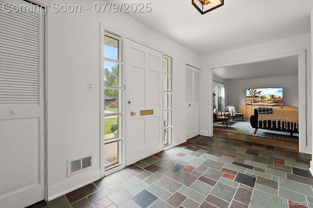 32010 Inglewood St, Franklin, MI 48025 - entrance foyer featuring stone tile floors and baseboards