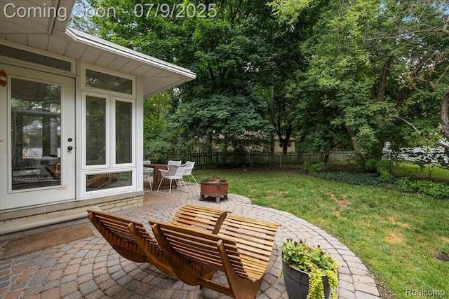 32010 Inglewood St, Franklin, MI 48025 - fenced backyard with a patio area and a fire pit