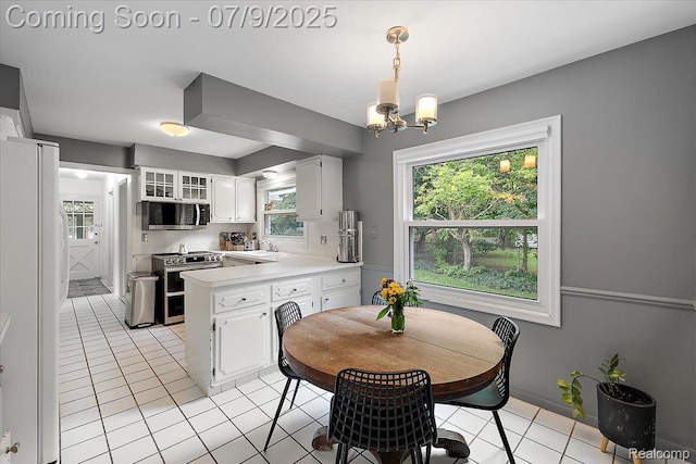 32010 Inglewood St, Franklin, MI 48025 - dining space featuring a chandelier and light tile patterned floors