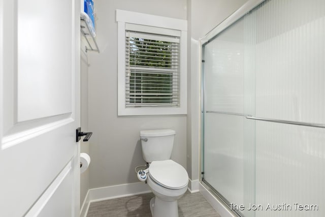 7979 Ella Terrace Dr, Rockford, MI 49341 - full bathroom featuring baseboards and a stall shower