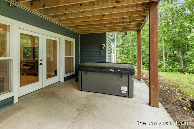 7979 Ella Terrace Dr, Rockford, MI 49341 - view of patio / terrace featuring a hot tub and french doors