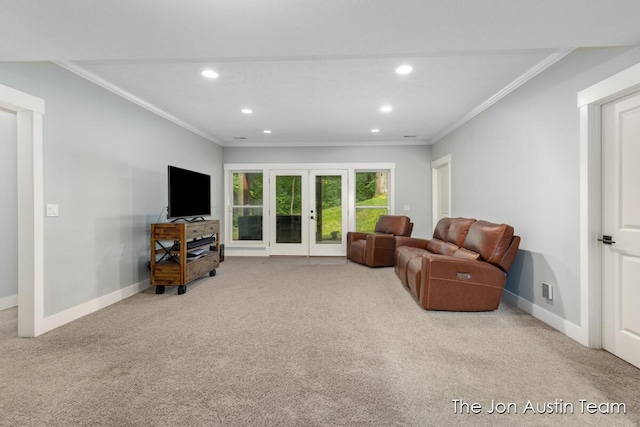 7979 Ella Terrace Dr, Rockford, MI 49341 - carpeted living room with ornamental molding, french doors, and recessed lighting