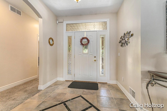 3566 Little Timber Ct SW, Grand Rapids, MI 49534 - foyer entrance featuring arched walkways and baseboards