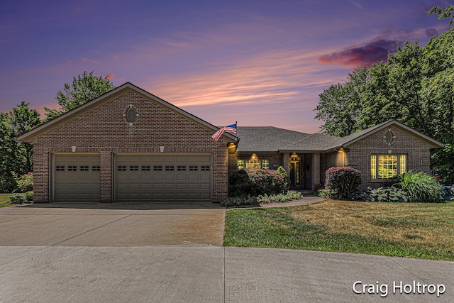 3566 Little Timber Ct SW, Grand Rapids, MI 49534 - view of front of house featuring brick siding, driveway, a garage, a yard, and a shingled roof