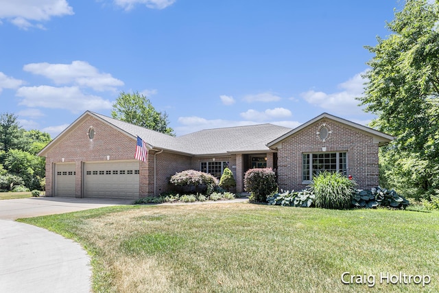 3566 Little Timber Ct SW, Grand Rapids, MI 49534 - single story home featuring brick siding, a garage, concrete driveway, a front yard, and a shingled roof