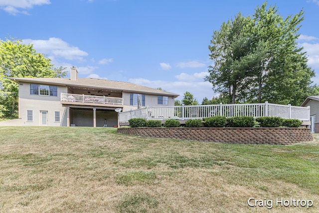 3566 Little Timber Ct SW, Grand Rapids, MI 49534 - back of property featuring a deck, a chimney, and a yard