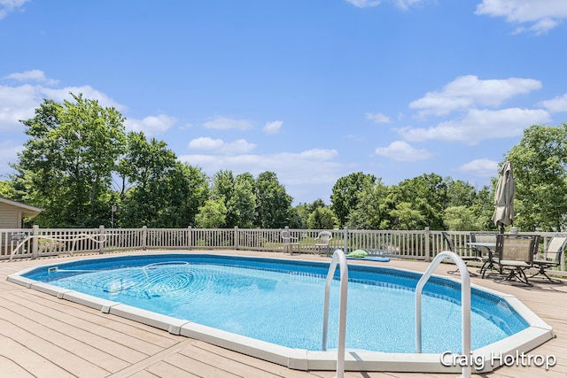 3566 Little Timber Ct SW, Grand Rapids, MI 49534 - view of swimming pool featuring a wooden deck