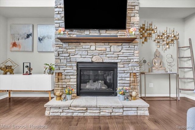 1043 Kendall Ct, Lake Orion, MI 48360 - detailed view of a fireplace and wood finished floors