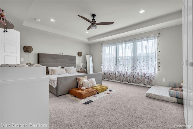 1043 Kendall Ct, Lake Orion, MI 48360 - bedroom with carpet floors, recessed lighting, a tray ceiling, and a ceiling fan