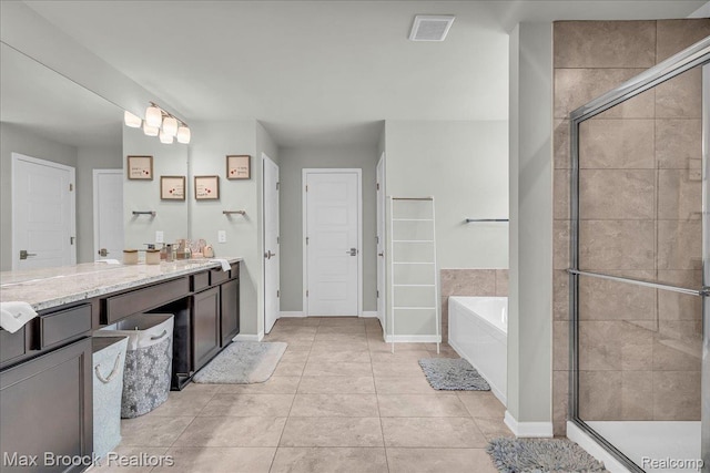 1043 Kendall Ct, Lake Orion, MI 48360 - full bathroom featuring a shower stall, vanity, a garden tub, and tile patterned flooring