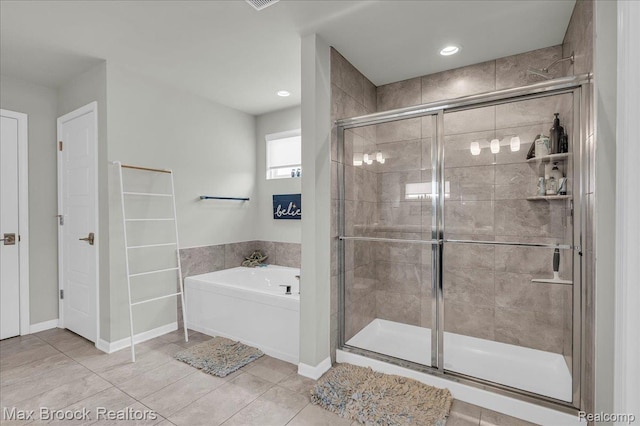 1043 Kendall Ct, Lake Orion, MI 48360 - bathroom with a bath, a shower stall, tile patterned floors, and recessed lighting