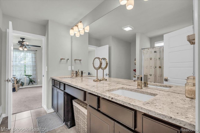 1043 Kendall Ct, Lake Orion, MI 48360 - full bath featuring double vanity, tile patterned floors, and ceiling fan