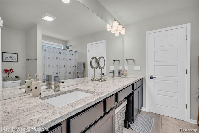 1043 Kendall Ct, Lake Orion, MI 48360 - full bath with double vanity, tile patterned flooring, and a shower with shower curtain