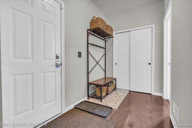 1043 Kendall Ct, Lake Orion, MI 48360 - mudroom with wood finished floors and baseboards
