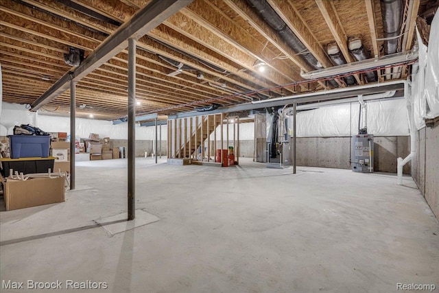 1043 Kendall Ct, Lake Orion, MI 48360 - unfinished basement with water heater, stairway, and heating unit