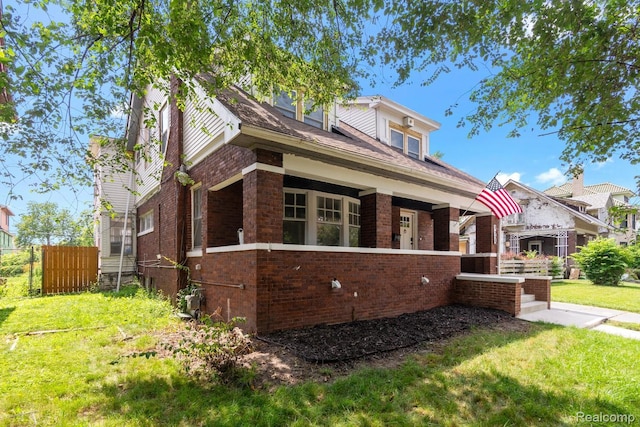 1725 Seyburn St, Detroit, MI 48214 - view of front of property with brick siding and covered porch