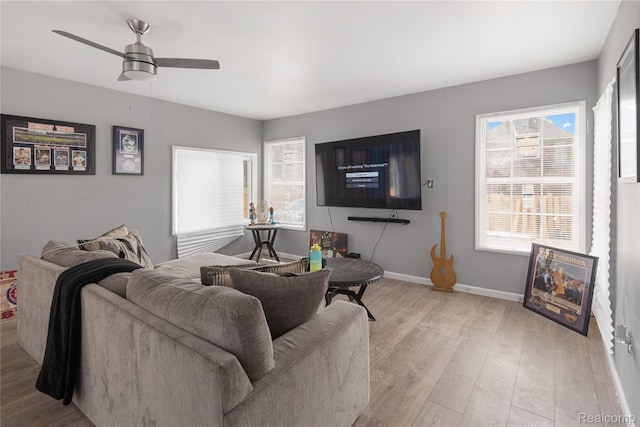 1725 Seyburn St, Detroit, MI 48214 - living room featuring ceiling fan and light wood-type flooring