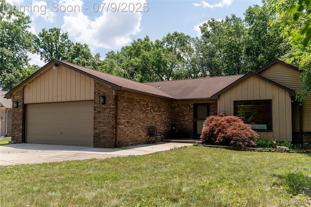 3580 Hazelton Ave, Rochester Hills, MI 48307 - view of front facade featuring an attached garage, concrete driveway, a front lawn, brick siding, and board and batten siding