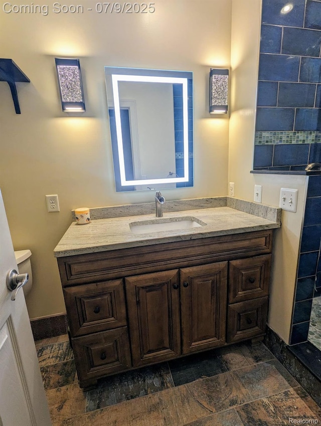 3580 Hazelton Ave, Rochester Hills, MI 48307 - bathroom with vanity and stone finish flooring