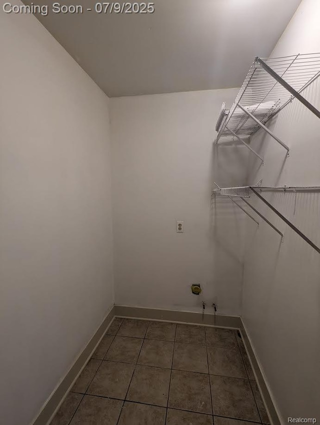 3580 Hazelton Ave, Rochester Hills, MI 48307 - laundry area featuring baseboards and tile patterned floors