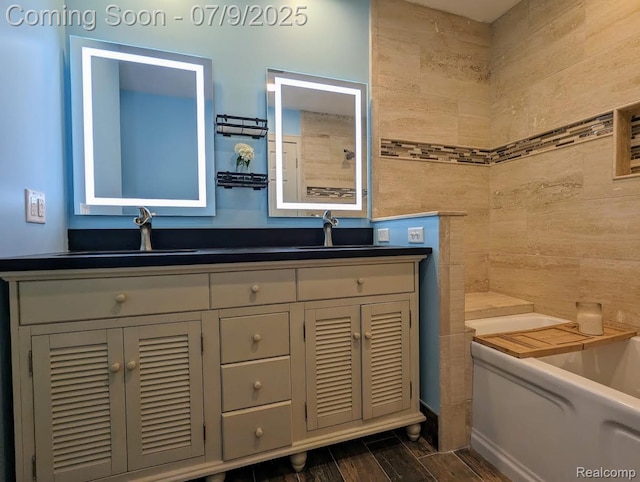 3580 Hazelton Ave, Rochester Hills, MI 48307 - full bathroom featuring double vanity, a bath, and wood finish floors