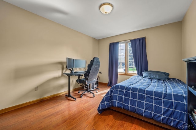 1381 Briarson Dr, Saginaw, MI 48638 - bedroom featuring wood finished floors and baseboards