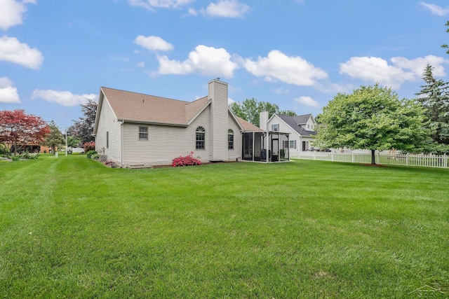 1381 Briarson Dr, Saginaw, MI 48638 - rear view of house featuring a chimney and roof with shingles