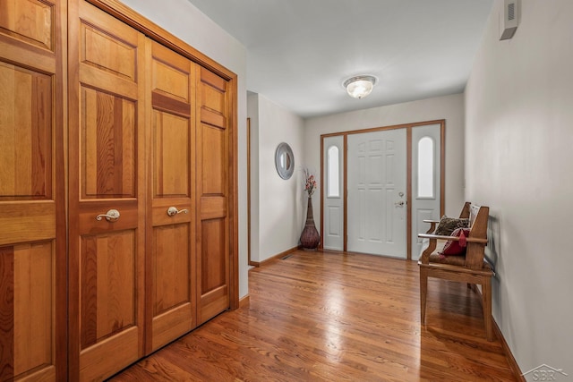 1381 Briarson Dr, Saginaw, MI 48638 - foyer entrance featuring baseboards and wood finished floors
