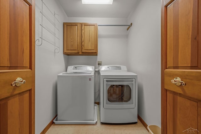 1381 Briarson Dr, Saginaw, MI 48638 - laundry area with cabinet space and independent washer and dryer