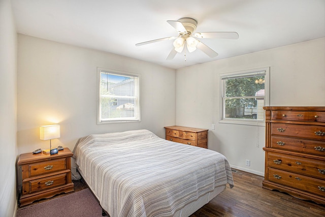 5468 Wellesley Dr, Jackson, MI 49201 - bedroom with multiple windows, wood finished floors, and ceiling fan