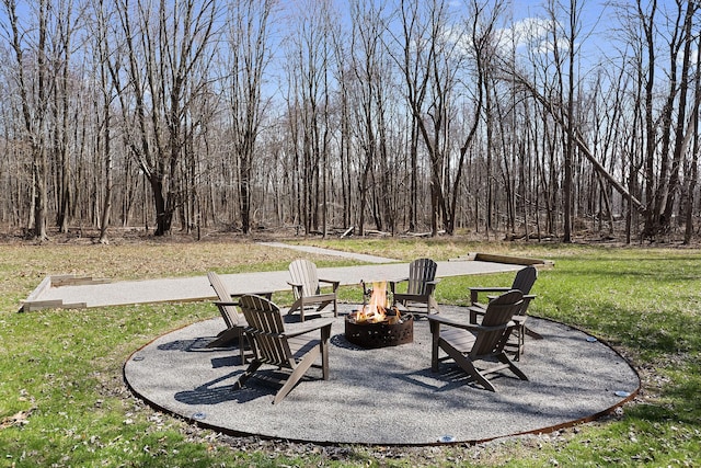 9442 Community Hall Rd, Union Pier, MI 49129 - view of patio / terrace featuring an outdoor fire pit