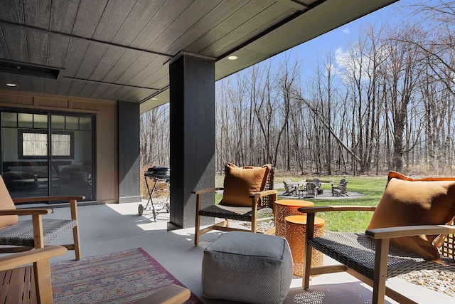 9442 Community Hall Rd, Union Pier, MI 49129 - view of patio featuring an outdoor fire pit