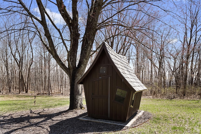9442 Community Hall Rd, Union Pier, MI 49129 - view of shed featuring a wooded view