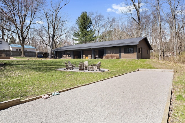 9442 Community Hall Rd, Union Pier, MI 49129 - view of front facade with a fire pit and a patio area