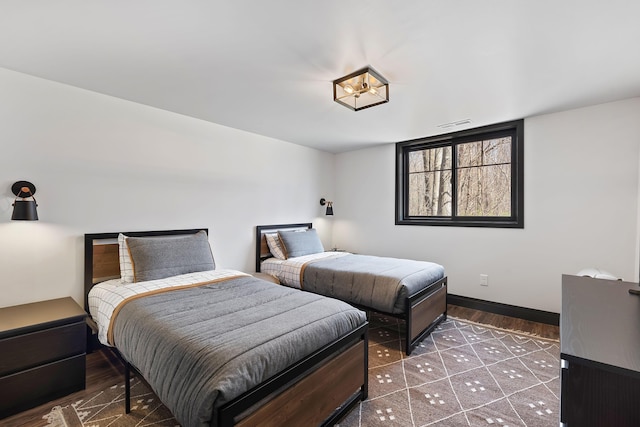 9442 Community Hall Rd, Union Pier, MI 49129 - bedroom featuring wood finished floors and baseboards