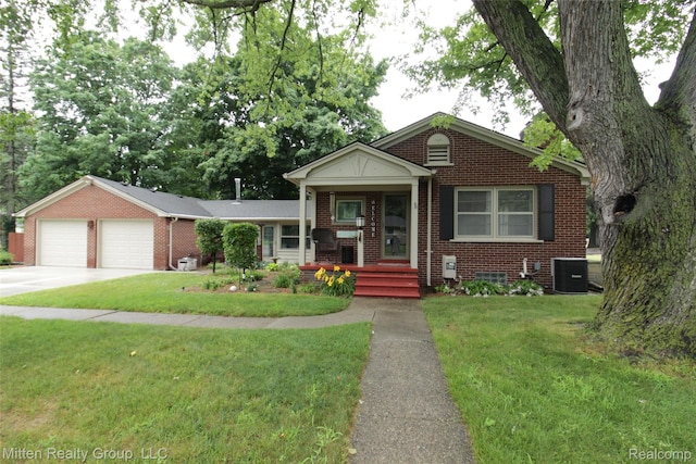 41079 E Ann Arbor Trl, Plymouth, MI 48170 - view of front of house featuring brick siding, driveway, a front yard, a porch, and an attached garage