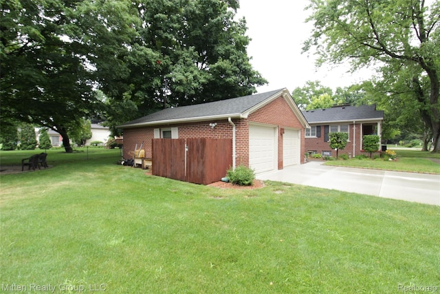 41079 E Ann Arbor Trl, Plymouth, MI 48170 - view of yard featuring a detached garage