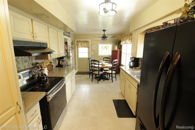 41079 E Ann Arbor Trl, Plymouth, MI 48170 - kitchen featuring freestanding refrigerator, stainless steel electric range, under cabinet range hood, ceiling fan, and light countertops