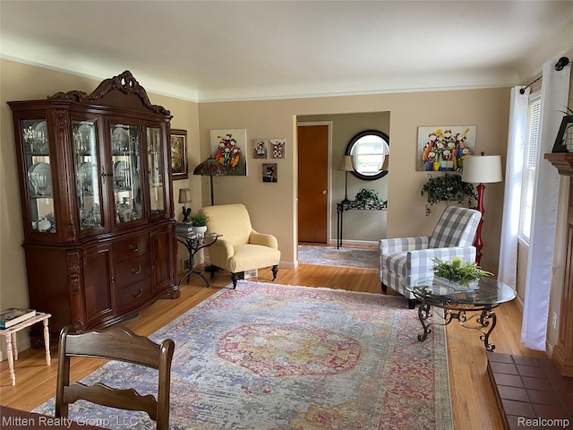 41079 E Ann Arbor Trl, Plymouth, MI 48170 - living area featuring light wood finished floors and ornamental molding