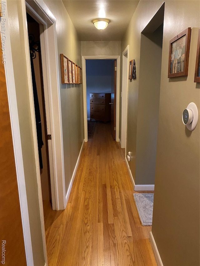 41079 E Ann Arbor Trl, Plymouth, MI 48170 - corridor featuring light wood-style floors and baseboards