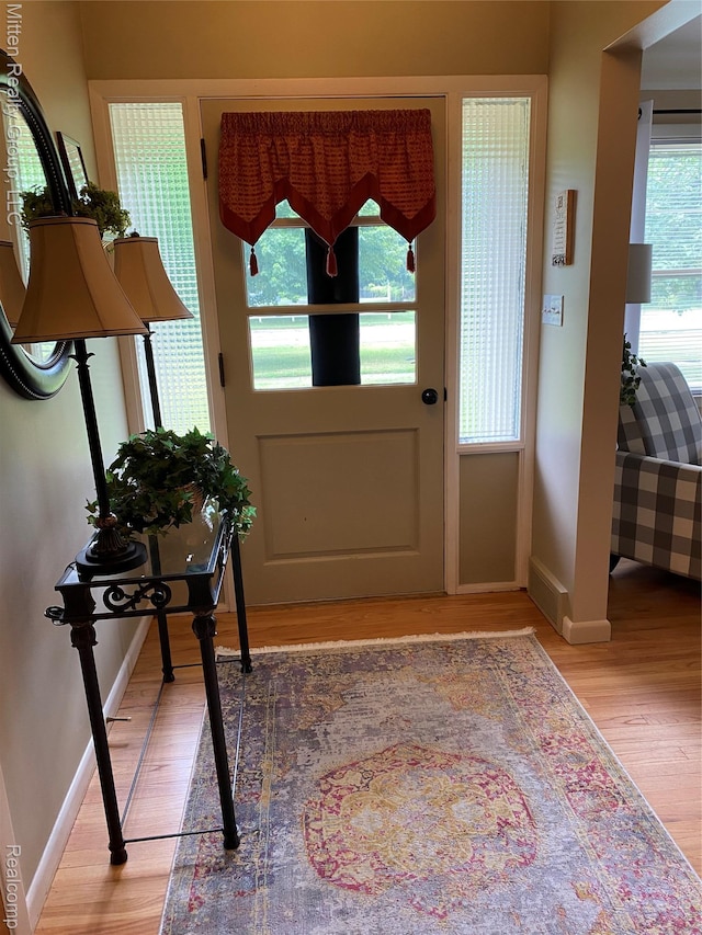 41079 E Ann Arbor Trl, Plymouth, MI 48170 - foyer featuring light wood finished floors and healthy amount of natural light