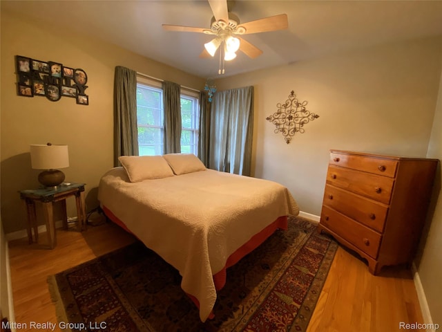 41079 E Ann Arbor Trl, Plymouth, MI 48170 - bedroom featuring wood finished floors and ceiling fan